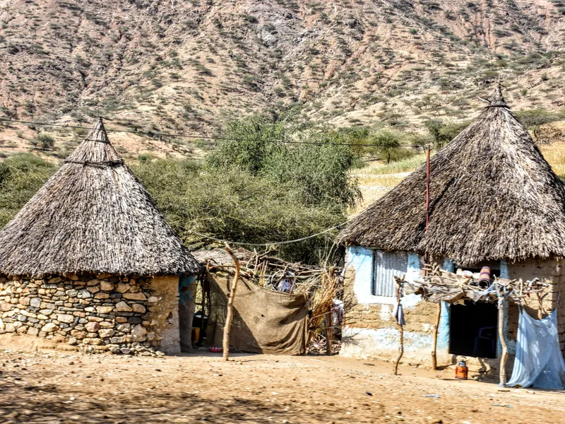 Traditional thatched stone houses in a rural village in Eritrea